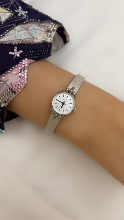 Silver diamond watch.