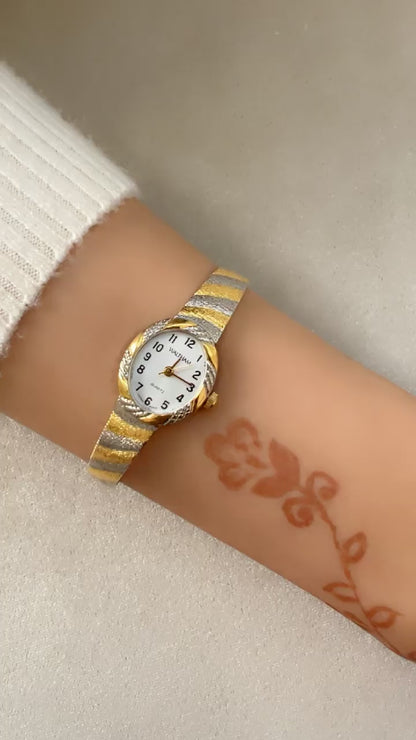 Vintage watch in gold and silver.